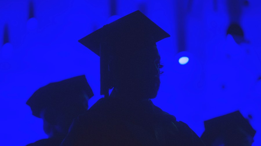 College graduates attend commencement