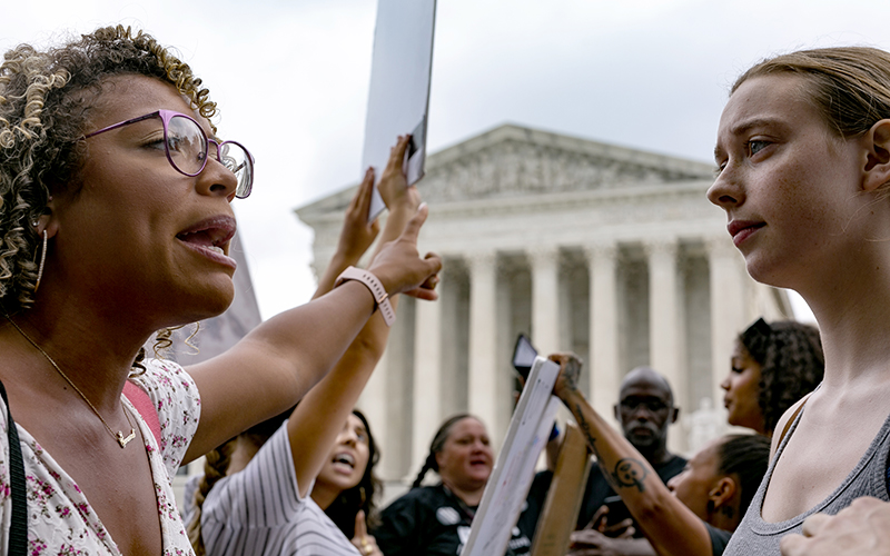 Protesters for and against abortion demonstrate outside the Supreme Court