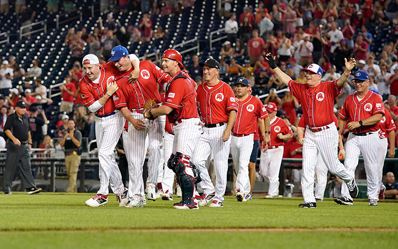 Republicans celebrate after beating the Democrats 10-0 in the Congressional Baseball Game