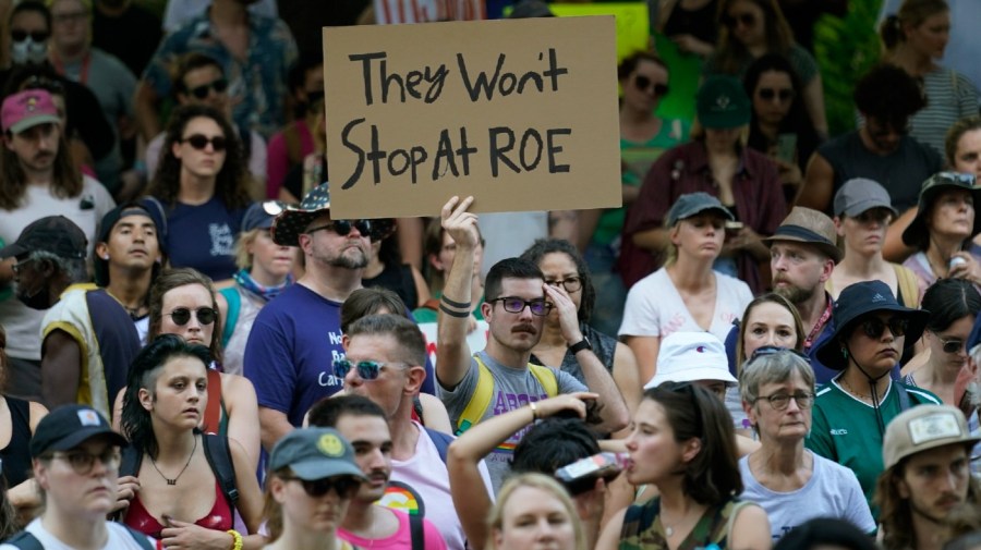 Demonstrators gather at the federal courthouse following the Supreme Court's decision to overturn Roe v. Wade, Friday, June 24, 2022, in Austin, Texas.