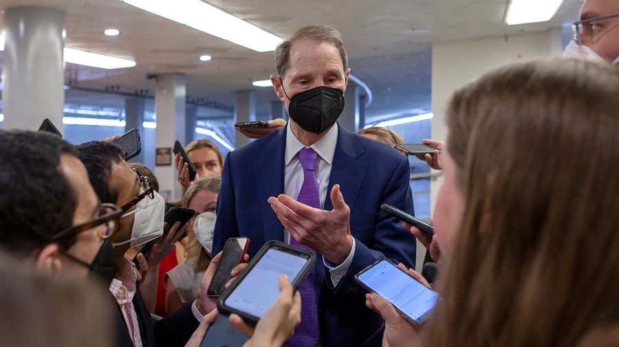 Sen. Ron Wyden (D-Ore.) enroute to the Senate Chamber for a vote to confirm Steven Dettelbach to be Director of the Bureau of Alcohol, Tobacco, Firearms, and Explosives on Tuesday, July 12, 2022.