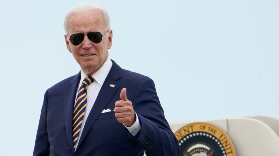 File photo - President Joe Biden gives a thumbs up as he boards Air Force One at Andrews Air Force Base, Md., Wednesday, Aug. 10, 2022. Biden is traveling to Kiawah Island, S.C., for vacation. (AP Photo/Manuel Balce Ceneta)