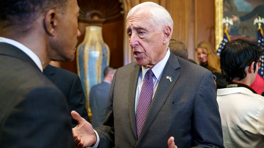 House Majority Leader Steny Hoyer (D-Md.) speaks to Rep. Kweisi Mfume (D-Md.)