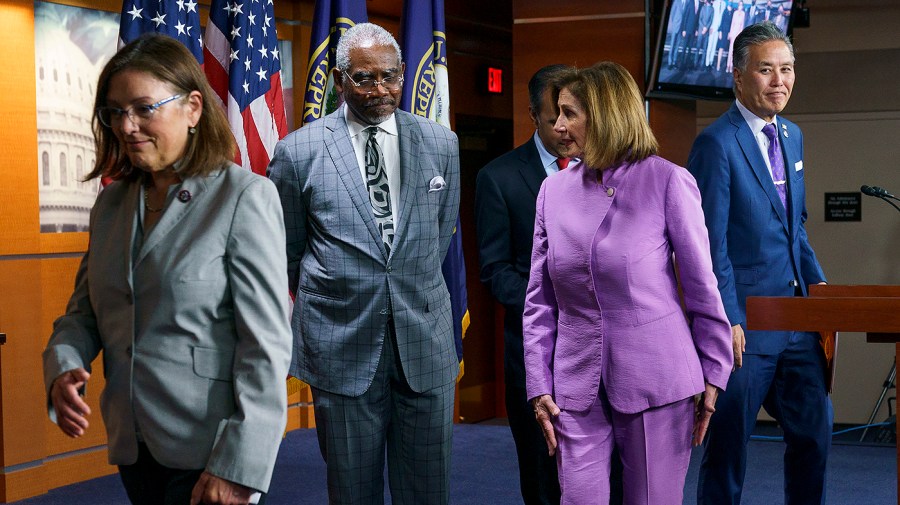 Rep. Gregory Meeks (D-N.Y.) and Speaker Nancy Pelosi (D-Calif.)