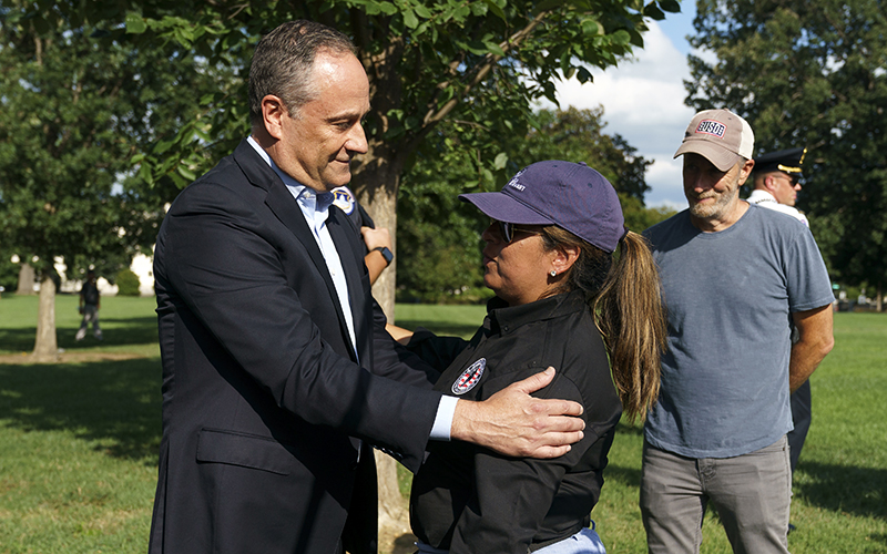 Second gentleman Doug Emhoff speaks with veteran activist Rosie Torres