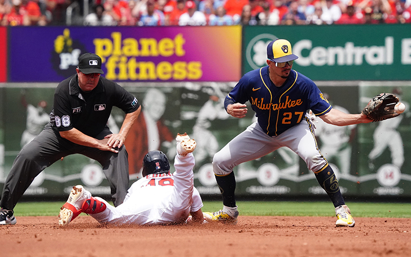 St. Louis Cardinals second baseman Tommy Edman slides head-first into second base