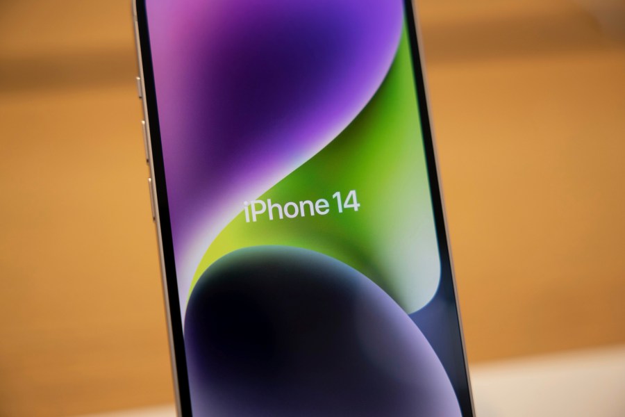 The iPhone 14 is displayed at the Apple Fifth Avenue store, Friday, Sept. 16, 2022, in New York. (AP Photo/Yuki Iwamura)