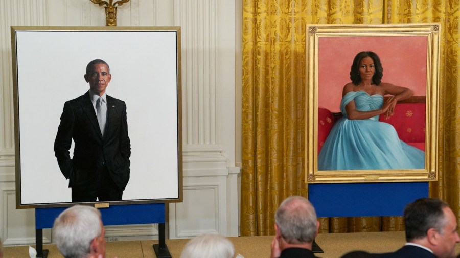 Portraits of former President Obama, left, and former first lady Michelle Obama, painted by Robert McCurdy and Sharon Sprung, respectively.