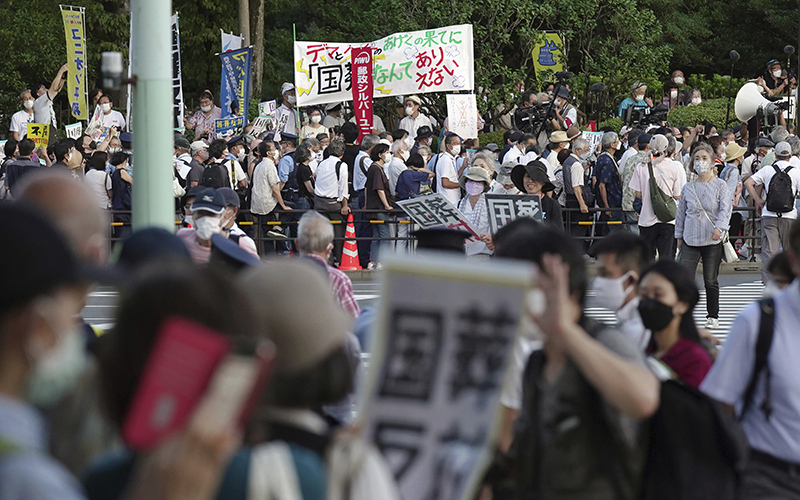 People protest outside the National Diet, Japan’s legislature