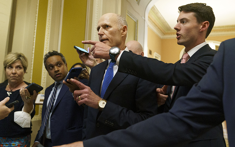 Sen. Rick Scott (R-Fla.) speaks to reporters