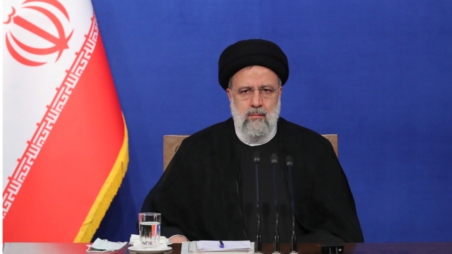 In this photo released by the official website of the office of the Iranian Presidency, President Ebrahim Raisi sits during his press conference in Tehran, Iran, Monday, Aug. 29, 2022.