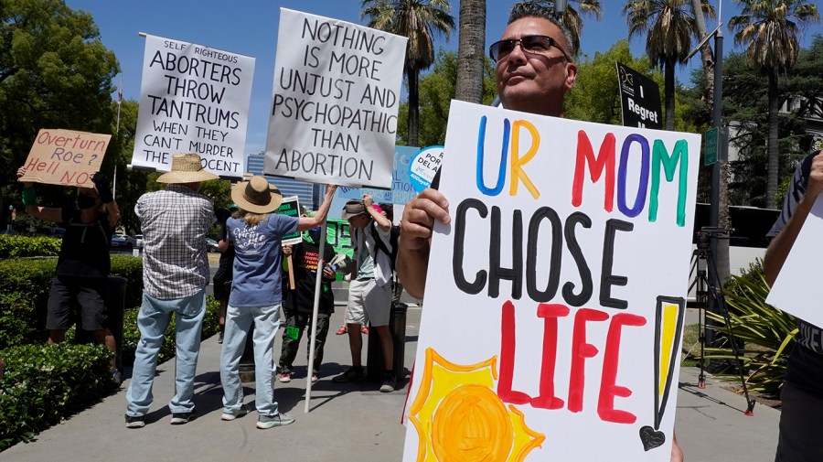 Anti-abortion supporters attend a rally