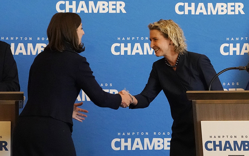 Rep. Elaine Luria (D-Va.) shakes the hand of Republican challenger Jen Kiggans after a debate