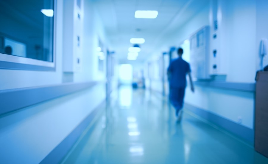 Blurred hospital hallway.