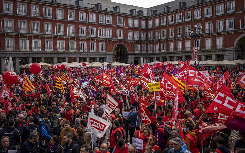 People gather during a protest in Madrid