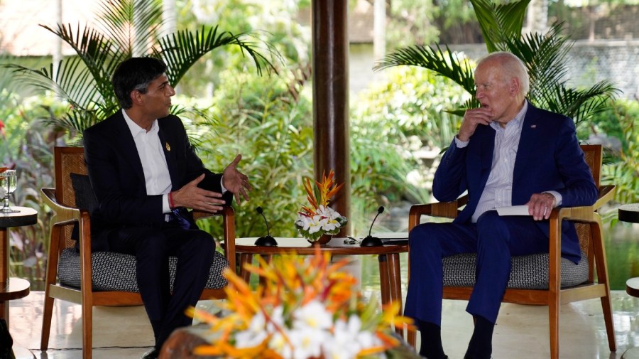 U.S. President Joe Biden, right, listens to British Prime Minister Rishi Sunak during a meeting on the sidelines of the G20 summit meeting, Wednesday, Nov. 16, 2022, in Nusa Dua, Bali, Indonesia.