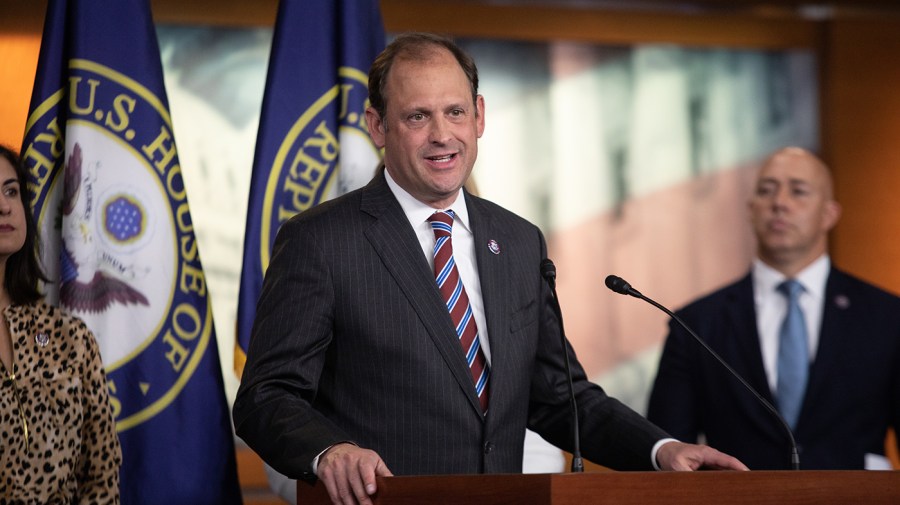 Andy Barr speaks at a podium