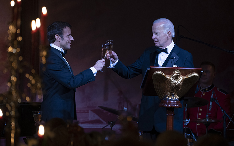 President Biden and French President Emmanuel Macron exchange toasts