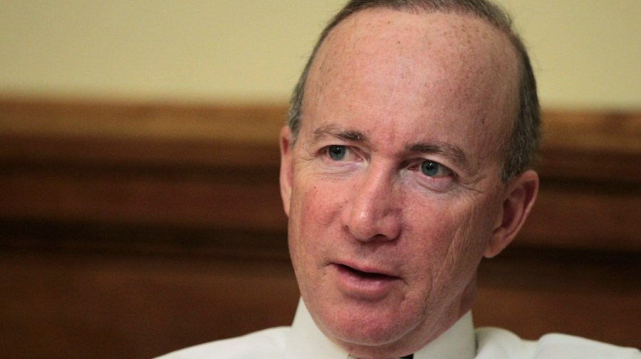 FILE - In this Dec. 29, 2011 file photo, Indiana Gov. Mitch Daniels responds to a question during an interview at the Statehouse, in Indianapolis.