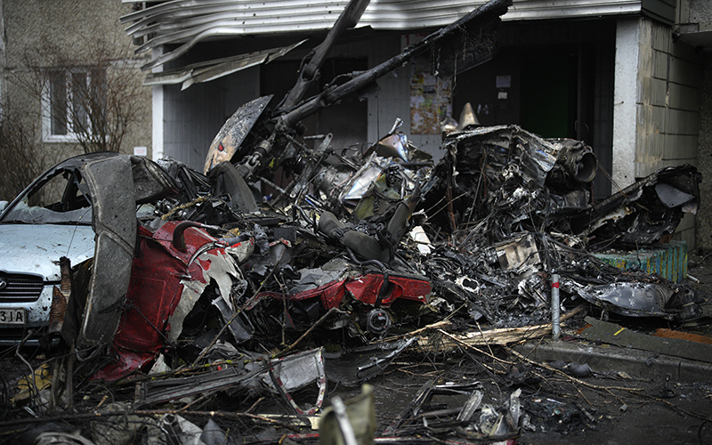 A view of the scene where a helicopter crashed on civil infrastructure in Brovary, on the outskirts of Kyiv