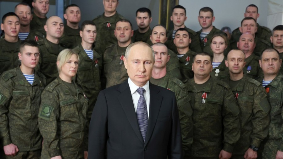 President Vladimir Putin speaks in a recording of his annual televised New Year's message on New Year's Eve after an awarding ceremony during his visit to the headquarters of the Southern Military District, at an unknown location in Russia, Saturday, Dec. 31, 2022. (Mikhail Klimentyev, Sputnik, Kremlin Pool Photo via AP)