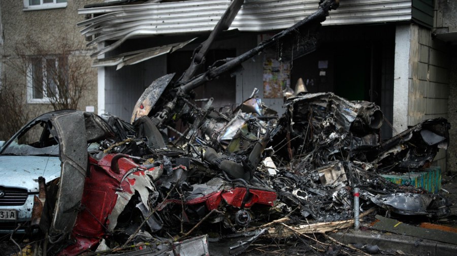 A view of the scene where a helicopter crashed on civil infrastructure in Brovary, on the outskirts of Kyiv, Ukraine, Wednesday, Jan. 18, 2023.