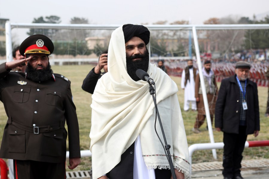 Taliban acting Interior Minister Sirajuddin Haqqani speaks during a graduation ceremony at the police academy in Kabul, Afghanistan.