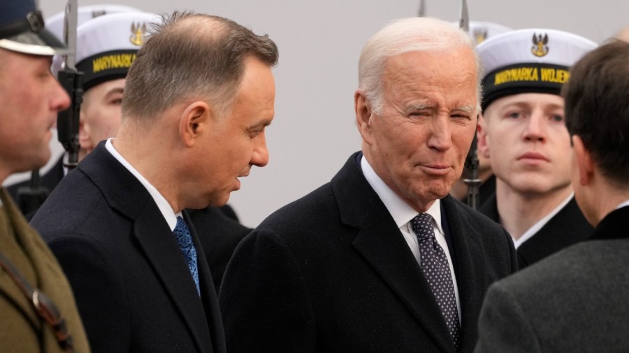 Polish President Andrzej Duda, left, welcomes President Joe Biden at the Presidential Palace in Warsaw, Ukraine, Tuesday, Feb. 21, 2023. Biden is visiting Poland a day after an unannounced visit to Kyiv to meet President Volodymyr Zelenskyy, that comes days before the first anniversary of Russia's invasion of Ukraine.