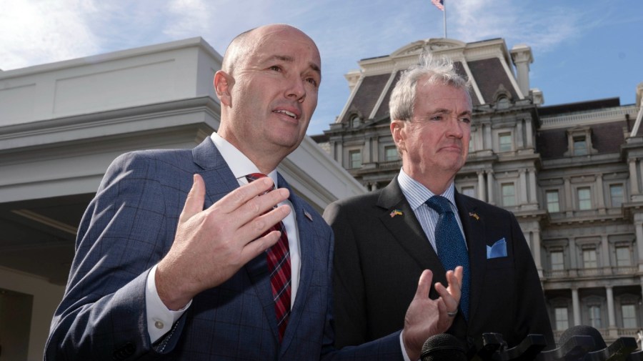 National Governors Association Vice Chair Gov. Spencer Cox, of Utah, and Chair Gov. Phil Murphy of N.J., right, speak to reporters outside the West Wing of the White House in Washington, following a meeting with President Joe Biden and Vice President Kamala Harris, Friday, Feb. 10, 2023.