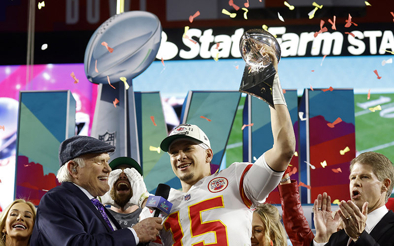 Kansas City Chiefs quarterback Patrick Mahomes celebrates with the Lombardi Trophy