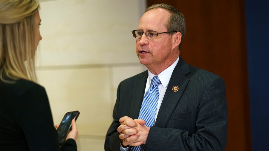 Representative Greg Murphy speaks to a reporter.