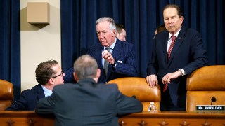 Reps. Richard Neal (D-Mass.) and Vern Buchanan (R-Fla.) arrive for a House Ways and Means Committee