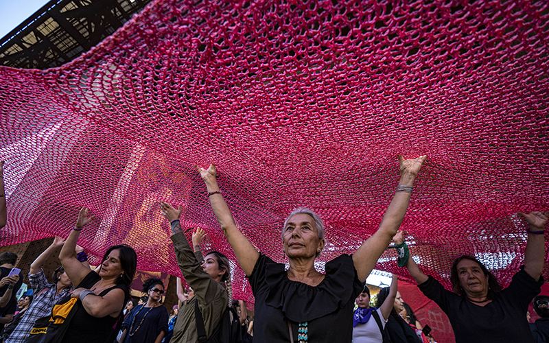 Women march against gender-based violence on International Women's Day in Santiago, Chile