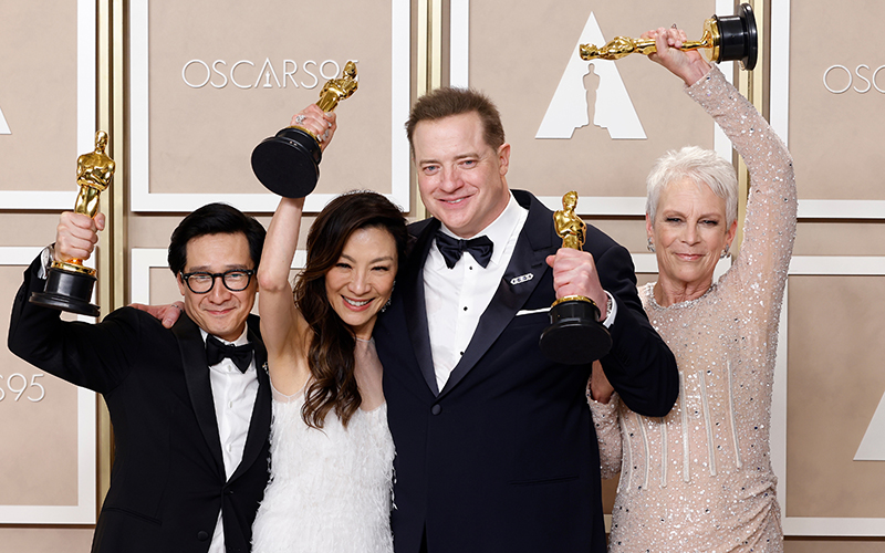 Oscar winners Ke Huy Quan, Michelle Yeoh, Brendan Fraser and Jamie Lee Curtis pose with their awards