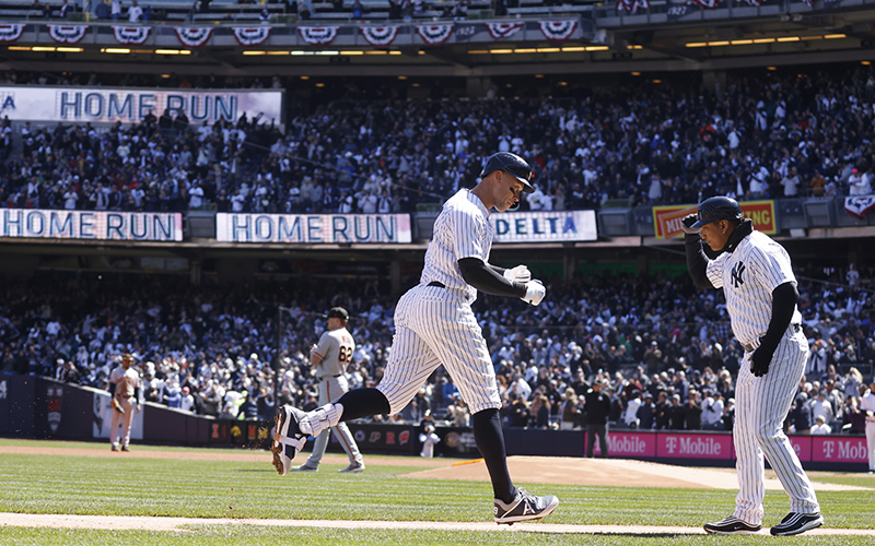 New York Yankees’ Aaron Judge hits a solo home run in the first inning against the San Francisco Giants