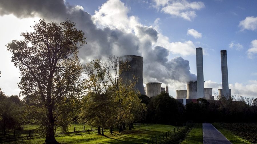 FILE - Steam rises from the coal-fired power plant Niederaussem, Germany, on Nov. 2, 2022. The burning of coal for electricity, cement, steel and other uses went up in 2022 despite global promises to phase down the fuel that's the biggest source of planet-warming gases in the atmosphere, a report late Wednesday, April 5, 2023, found. (AP Photo/Michael Probst, File)