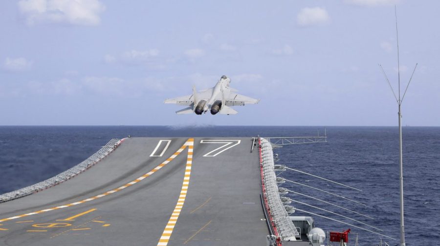 In this photo released by Xinhua News Agency, a J-15 Chinese fighter jet takes off from the Shandong aircraft carrier during the combat readiness patrol and military exercises around the Taiwan Island by the Eastern Theater Command of the Chinese People's Liberation Army (PLA) on Sunday, April 9, 2023. China's military declared Monday it is "ready to fight" after completing three days of large-scale combat exercises around Taiwan that simulated sealing off the island in response to the Taiwanese president's trip to the U.S. last week. (An Ni/Xinhua via AP)