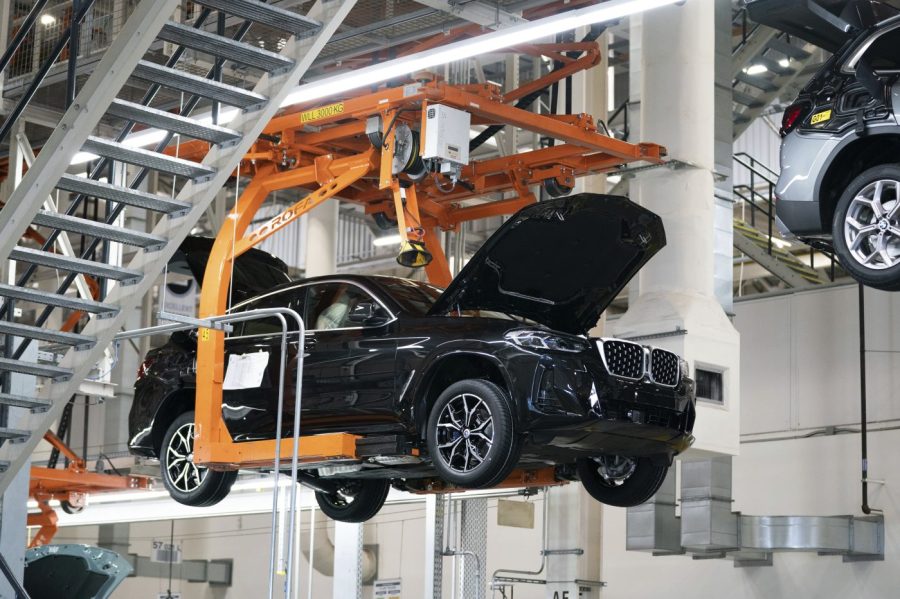 File - Cars move on the assembly line at the BMW Spartanburg plant in Greer, S.C., Wednesday, October 19, 2022. On Thursday, the Labor Department releases the producer price index for March, an indicator of inflation at the wholesale level that's closely monitored by the Federal Reserve. (AP Photo/Sean Rayford)