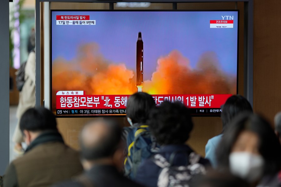 A TV screen is seen reporting North Korea's missile launch with file footage during a news program at the Seoul Railway Station in Seoul, South Korea, Thursday, April 13, 2023. North Korea launched a ballistic missile that landed in the waters between the Korean Peninsula and Japan on Thursday, prompting Japan to order residents on an island to take shelter as a precaution. The order has been lifted. (AP Photo/Lee Jin-man)