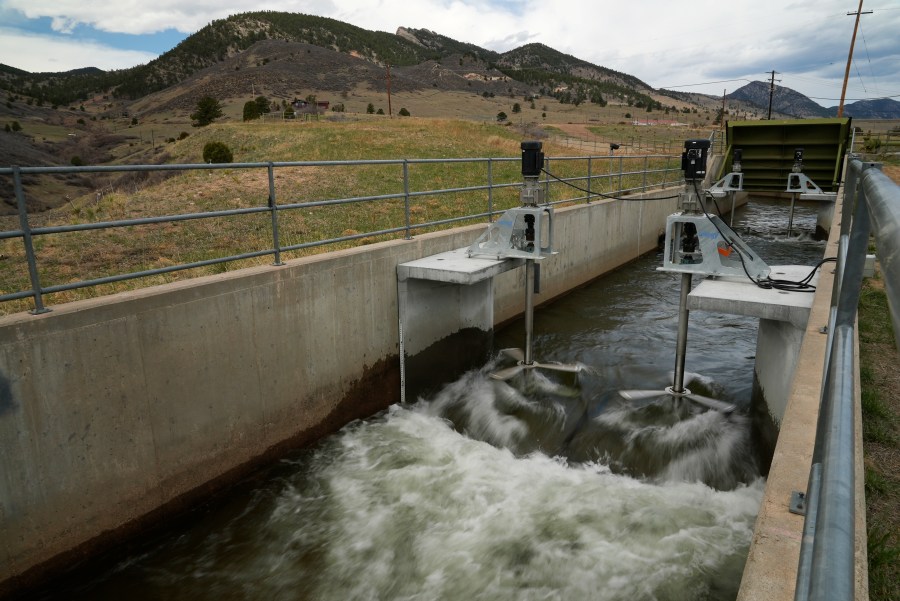 Water flows through an irrigation canal with a turbine at Ralston Reservoir in Arvada Colo. on Thursday, April 13, 2023.