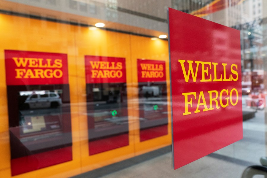 FILE - This Jan. 13, 2021 file photo shows a Wells Fargo office in New York. Wells Fargo & Co. reports earnings on Friday, April 24, 2023. (AP Photo/Mark Lennihan, File)