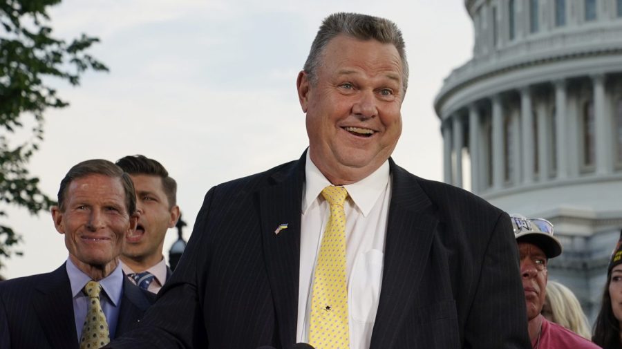 FILE - Sen. Jon Tester, D-Mont., speaks at a news conference alongside Sen. Richard Blumenthal, D-Conn., back left, on Aug. 2, 2022, on Capitol Hill in Washington. Libertarians lined up with Democrats on Friday against a proposal that would effectively block out third party candidates from next year's Montana U.S. Senate election. Republicans are trying to consolidate opposition to incumbent Jon Tester in a race that's pivotal for control of the the Senate. (AP Photo/Patrick Semansky, File)