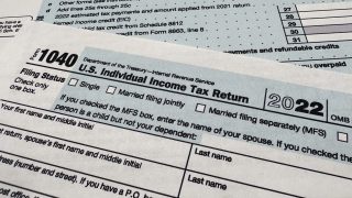 The Internal Revenue Service 1040 tax form for 2022 is photographed, Monday, April 17, 2023. The IRS says it has answered 2 million more calls this tax filing season than a year ago, with the average phone wait time now at four minutes. That's down considerably from 27 minutes for the 2022 tax season. (AP Photo/Jon Elswick)