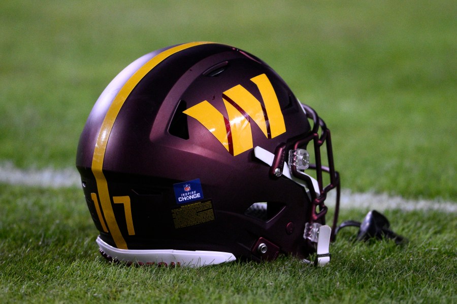 FILE - A Washington Commanders helmet is seen before an NFL football game against the New York Giants, Sunday, Dec. 18, 2022, in Landover, Md. Dan Snyder has an agreement in principle to sell the Washington Commanders to a group led by Josh Harris and Mitchell Rales that includes Magic Johnson for a North American professional sports team record $6.05 billion. (AP Photo/Nick Wass, File)