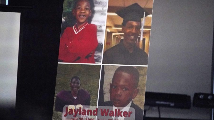 FILE - This is a poster on the stage during a news conference following the funeral service for Jayland Walker at the Akron Civic Center in Akron, Ohio, July 13, 2022. A grand jury in Ohio will hear evidence this week to decide whether police officers should face criminal charges in the shooting of Jayland Walker, a 25-year-old Black man whose death sparked protests in Akron last summer. (AP Photo/Gene J. Puskar, File)