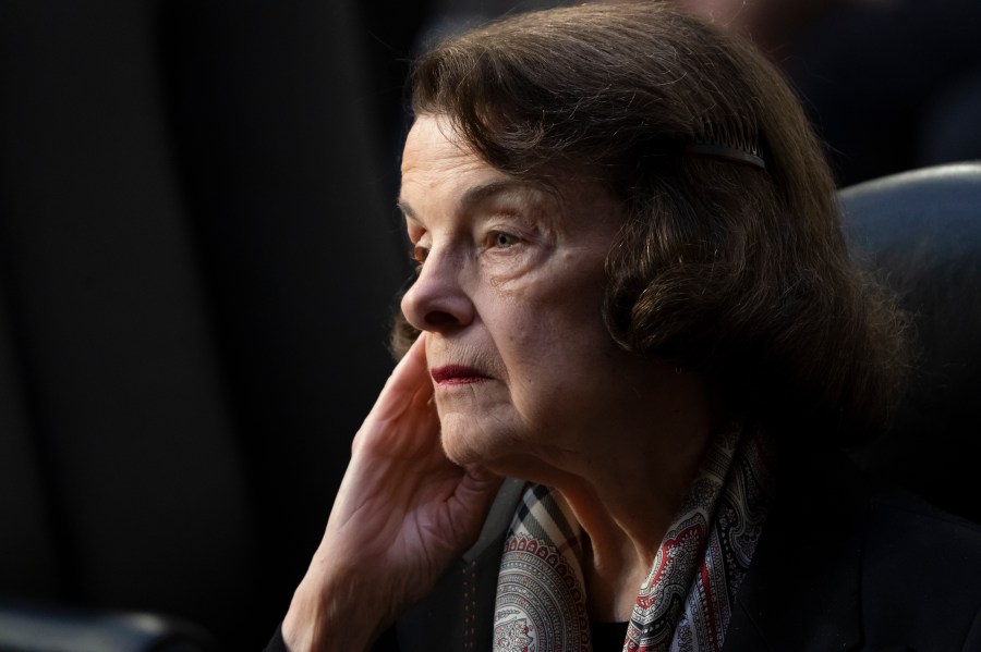 FILE - Sen. Dianne Feinstein, D-Calif., listens as the Senate Judiciary Committee begins debate on Ketanji Brown Jackson's nomination for the Supreme Court, in Washington, April 4, 2022. Democrats’ efforts to temporarily replace Feinstein on the Senate Judiciary Committee met quick opposition Monday, April 17, 2023, from some Republicans, potentially complicating the plan even as some of President Joe Biden’s judicial nominees remain on hold during her extended medical absence. Feinstein last week asked to be temporarily replaced on the Senate Judiciary Committee while she recuperates in her home state from a case of shingles. (AP Photo/J. Scott Applewhite, File)