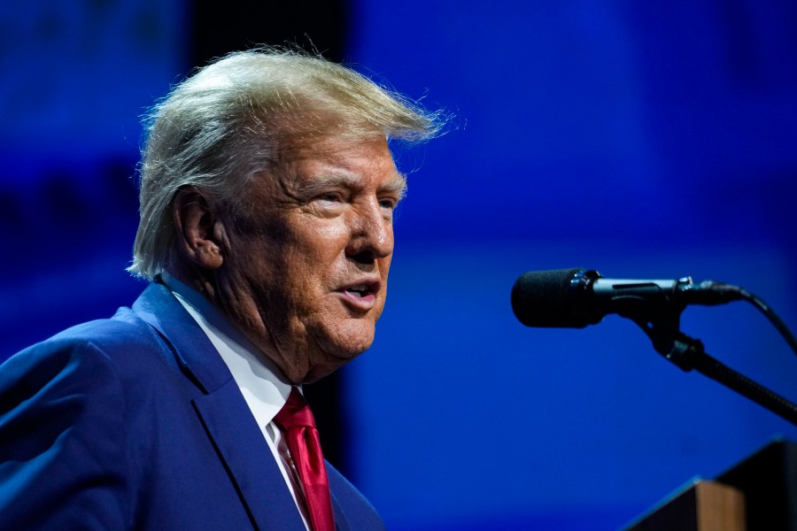 FILE - Former President Donald Trump speaks at the National Rifle Association Convention in Indianapolis, Friday, April 14, 2023. ury selection starts Tuesday in E. Jean Carroll's rape lawsuit in a New York federal court. The former Elle magazine advice columnist alleges that Trump raped her in a luxury department store dressing room in the mid-1990s. (AP Photo/Michael Conroy, File)