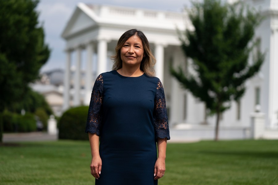 FILE - White House Intergovernmental Affairs director Julie Chavez Rodriguez stands outside the White House, Wednesday, June 9, 2021, in Washington. The granddaughter of Cesar Chavez and a bronze bust of the late Latino labor activist have had prominent places in President Joe Biden’s White House. And now Julie Chavez Rodriguez is moving on from his White House staff to take another high-profile position at the helm of Biden's reelection campaign. (AP Photo/Evan Vucci, File)