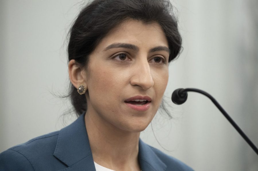 FILE - Lina Khan, then a nominee for Commissioner of the Federal Trade Commission (FTC), speaks during a Senate Committee on Commerce, Science, and Transportation confirmation hearing, April 21, 2021 on Capitol Hill in Washington. The federal government will "not hesitate to crack down" on harmful business practices involving artificial intelligence, Federal Trade Commission head Khan warned Tuesday. (Saul Loeb/Pool via AP, File)