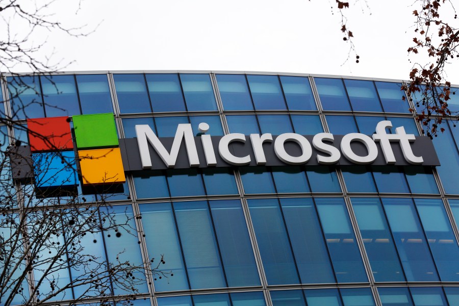 FILE - The Microsoft logo is pictured outside the headquarters in Paris, Jan. 8, 2021. British regulators have blocked Microsoft's $69 billion deal to buy videogame maker Activision Blizzard over worries that it would stifle competition in the cloud gaming market. (AP Photo/Thibault Camus, File)